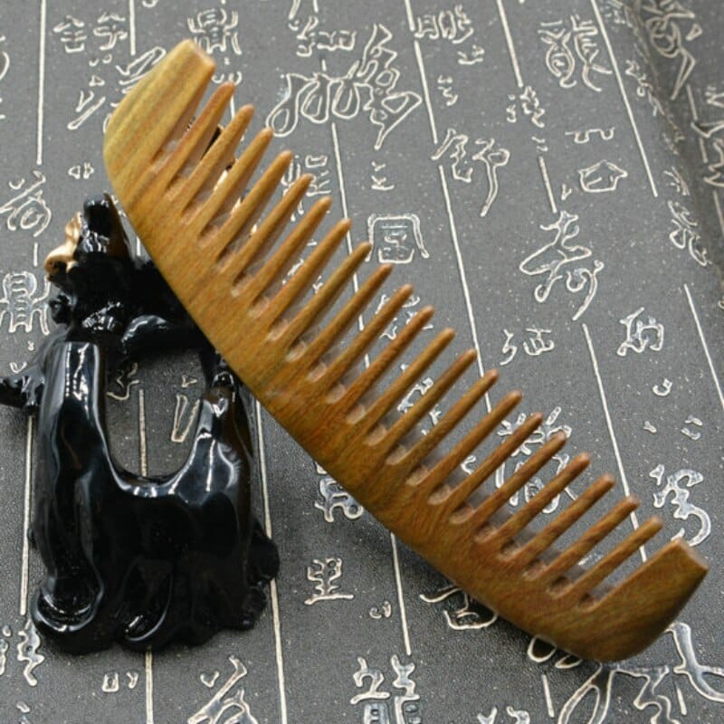 Peigne démêloir en bois de santal à dents larges Dent centrale